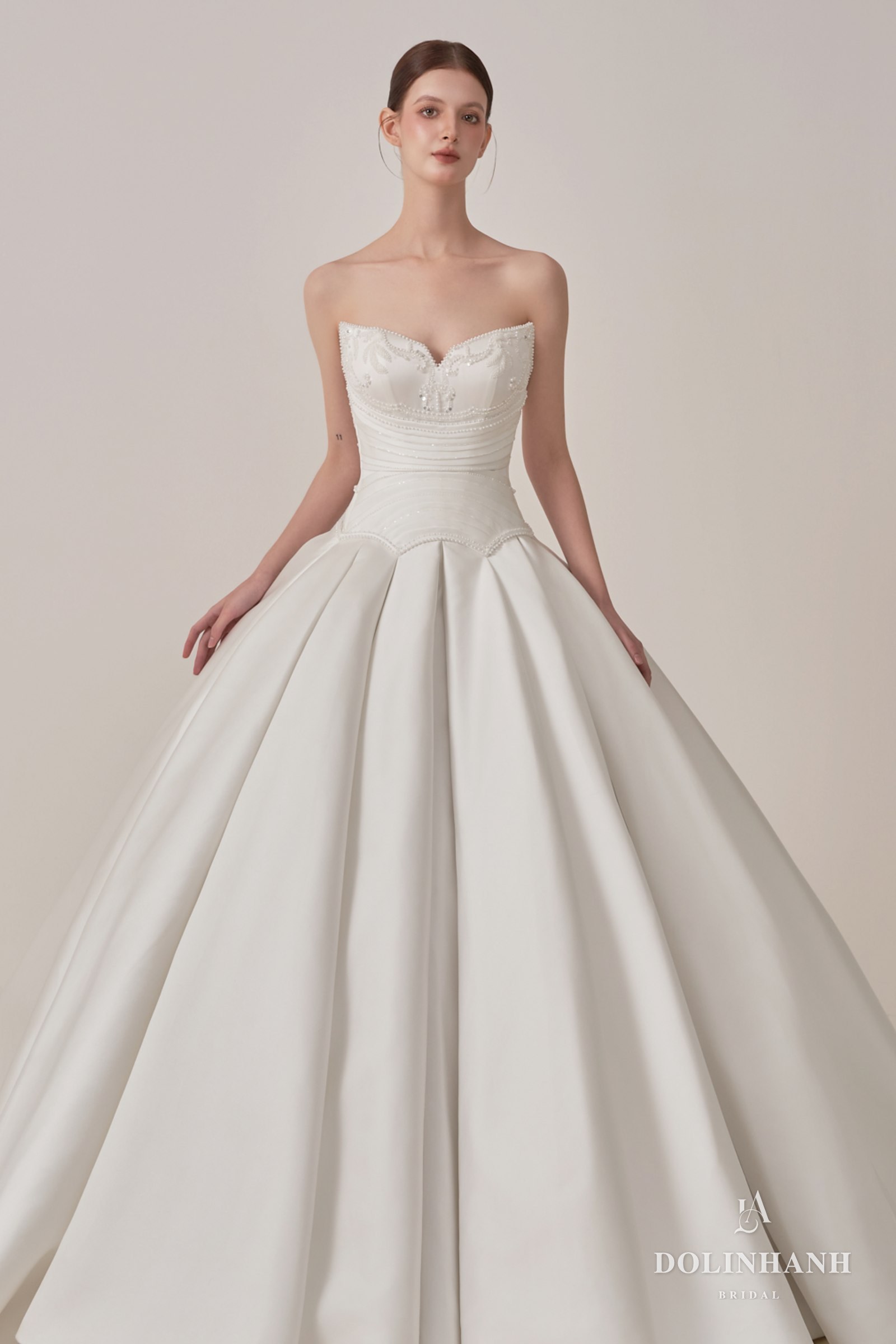 Strapless satin ball gown with a sweetheart neckline